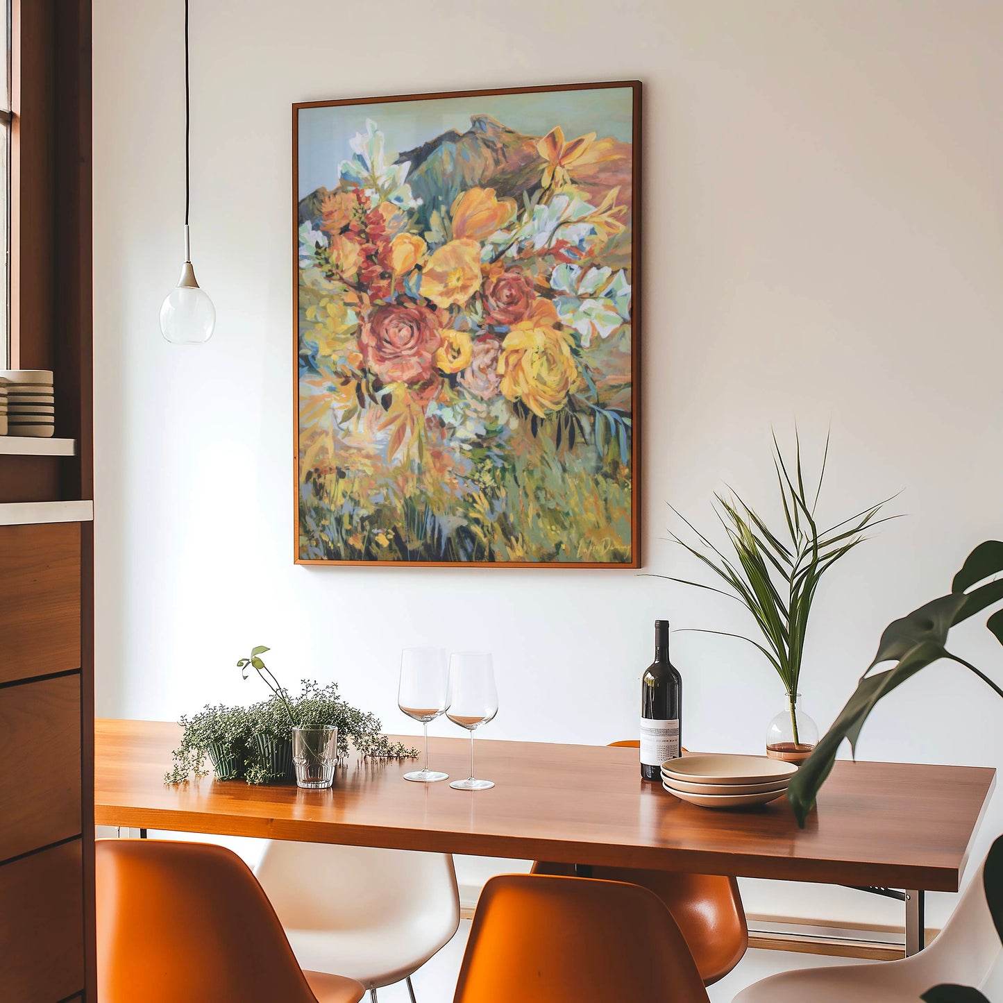 Dining room with a wooden table, chairs, and a floral painting on the wall.
