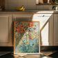Floral painting on a kitchen counter with cabinets and a tiled wall in the background.